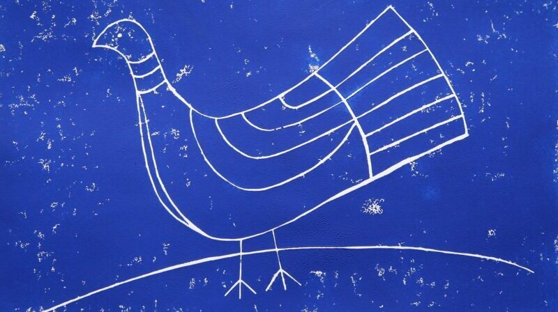 A royal blue lino print of a stylised bird